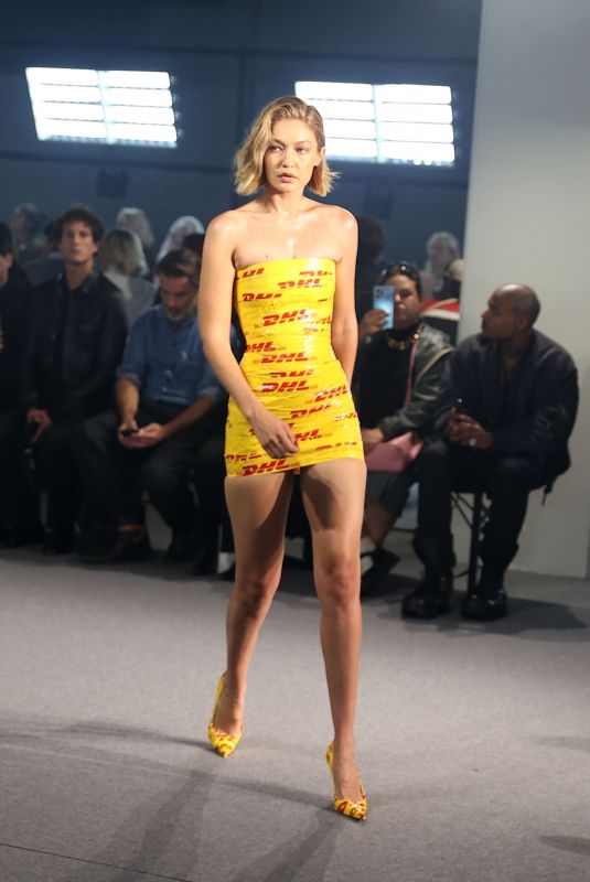 GIGI HADID in DHL Packing Tape Walks Vetements Runway Show in Paris 09/28/2024