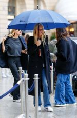 GWYNETH PALTROW Braves Rrain Out at PFW in Paris 09/25/2024