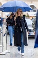 GWYNETH PALTROW Braves Rrain Out at PFW in Paris 09/25/2024