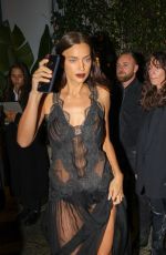 IRINA SHAYK Arrives at Vogue Italia 60th Anniversary X Ray-Ban Event at Milan Fashion Week 09/18/2024