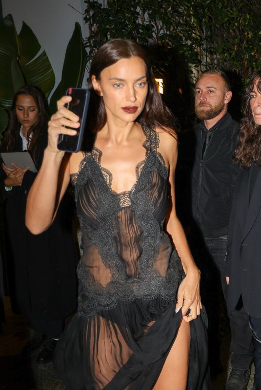 IRINA SHAYK Arrives at Vogue Italia 60th Anniversary X Ray-Ban Event at Milan Fashion Week 09/18/2024