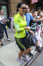KATY PERRY in a Green Neon Sports Outfit Leaves Her Hotel in New York 09/07/2024
