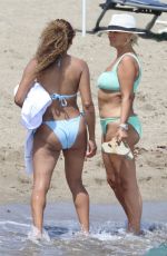 KERRY KATONA and DANIELLE BROWN in Bikinis at a Beach in Marbella 08/30/2024