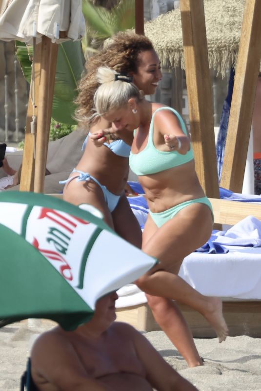 KERRY KATONA and DANIELLE BROWN in Bikinis at a Beach in Marbella 08/30/2024
