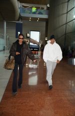 LAURA HARRIER and Sam Jarou Arrives at Paris CDG Airport 09/22/2024