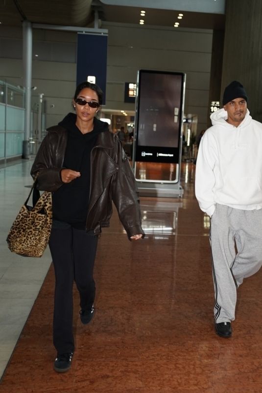 LAURA HARRIER and Sam Jarou Arrives at Paris CDG Airport 09/22/2024