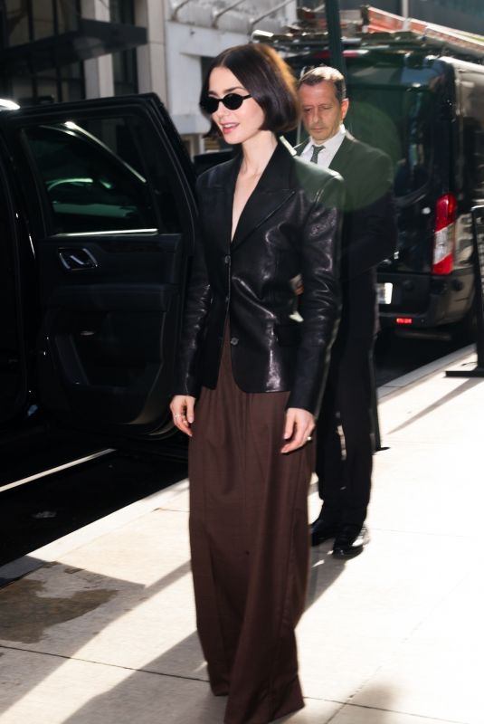 LILY COLLINS in a Black Leather Jacket Out in New York 09/19/2024