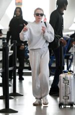 LINDSAY LOHAN Arrives at JFK Airport in New York 09/23/2024