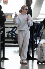 LINDSAY LOHAN Arrives at JFK Airport in New York 09/23/2024