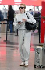 LINDSAY LOHAN Arrives at JFK Airport in New York 09/23/2024