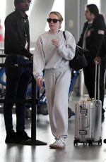 LINDSAY LOHAN Arrives at JFK Airport in New York 09/23/2024
