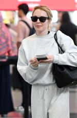 LINDSAY LOHAN Arrives at JFK Airport in New York 09/23/2024