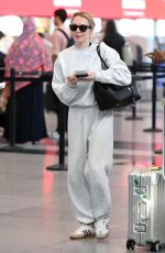 LINDSAY LOHAN Arrives at JFK Airport in New York 09/23/2024