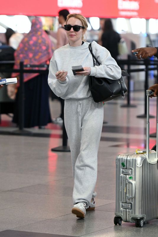 LINDSAY LOHAN Arrives at JFK Airport in New York 09/23/2024