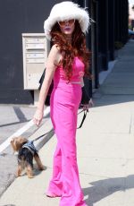 PHOEBE PRICE Out in a Pink Ensemble with Her Dog in Los Angeles 09/13/2024