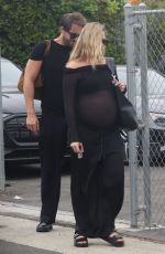 Pregnant MARGOT ROBBIE Out with Her Husband in Brentwood 09/24/2024