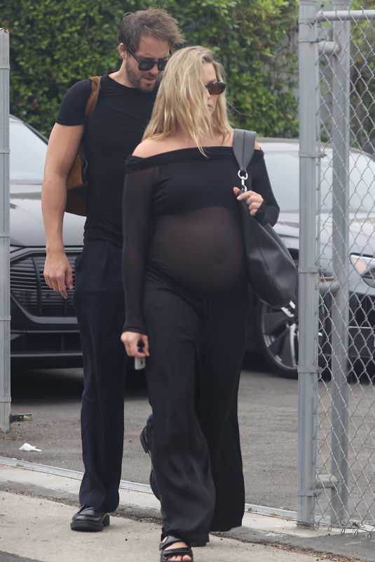 Pregnant MARGOT ROBBIE Out with Her Husband in Brentwood 09/24/2024