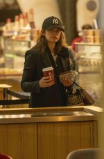 RUTH WILSON Grabbing a Costa Coffee at Heathrow Airport in London 09/19/2024