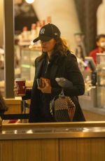 RUTH WILSON Grabbing a Costa Coffee at Heathrow Airport in London 09/19/2024
