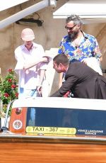 TILDA SWINTON and Sandro Kopp Catching a Taxi Boat in Venice 08/31/2024