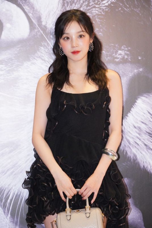 YUQI at Tory Burch Store Opening in Hong Kong 08/26/2024