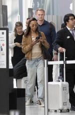 ZOE SALDANA Arrives at Airport in Toronto 09/10/2024