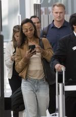 ZOE SALDANA Arrives at Airport in Toronto 09/10/2024