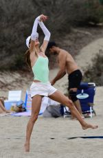 ALESSANDRA AMBROSIO in Swimsuit Playing Volleyball on the Beach in Los Angeles 10/06/2024