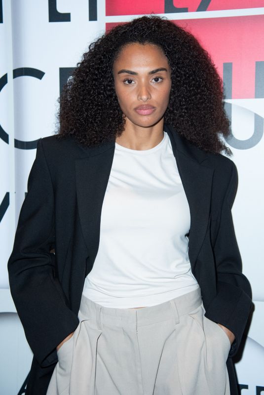 ALIZEE PRISO at Uniqlo Lifewear Exhibition Cocktail in Paris 09/30/2024