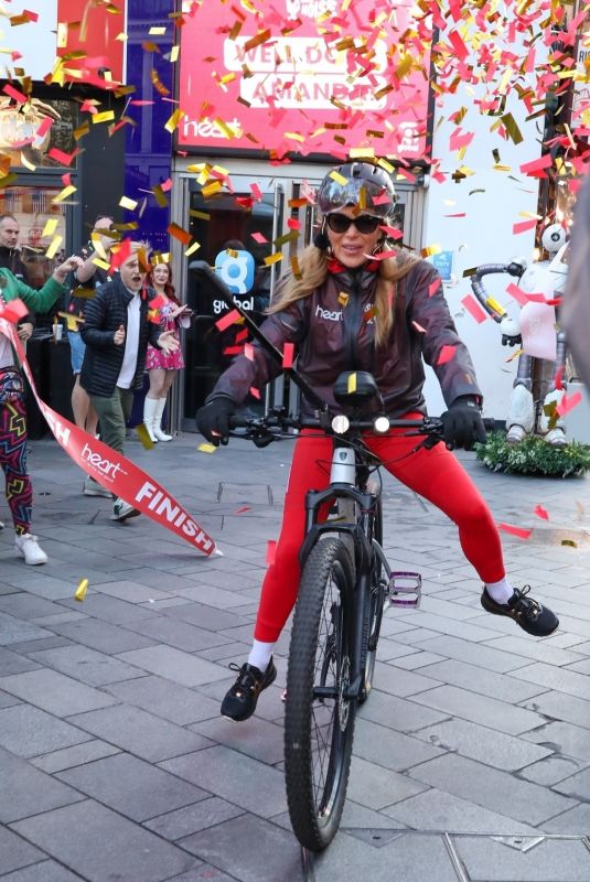 AMANDA HOLDEN Celebrates Completing Her Cycle Challenge in London 10/11/2024