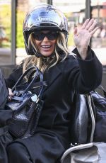 AMANDA HOLDEN Leaves Global Studios on a Motorcycle in London 10/04/2024