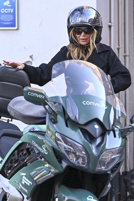 AMANDA HOLDEN Leaves Global Studios on a Motorcycle in London 10/04/2024