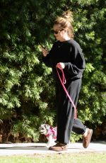 ASHLYE TISDALE Out for a Walk with Her Dog in Los Angeles 10/02/2024
