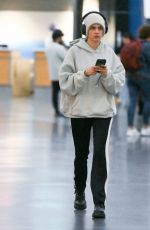 CARA DELEVINGNE Arrives at JFK Airport in New York 10/07/2024