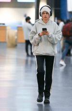 CARA DELEVINGNE Arrives at JFK Airport in New York 10/07/2024