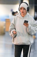 CARA DELEVINGNE Arrives at JFK Airport in New York 10/07/2024
