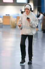 CARA DELEVINGNE Arrives at JFK Airport in New York 10/07/2024