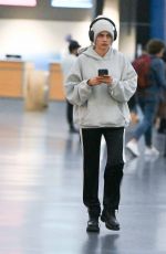 CARA DELEVINGNE Arrives at JFK Airport in New York 10/07/2024