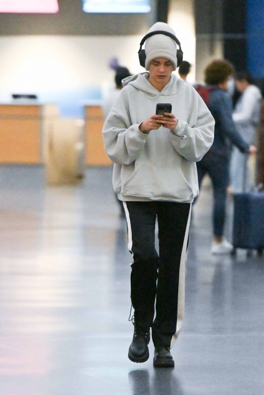 CARA DELEVINGNE Arrives at JFK Airport in New York 10/07/2024