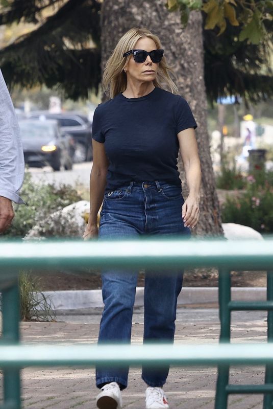 CHERYL HINES Stopping by a House After a Stop at Starbucks in Malibu 10/04/2024