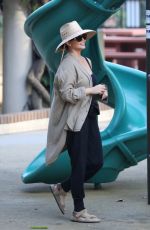 CHRISSY TEIGEN at a Park on Beverly Glen in Los Angeles 10/04/2024