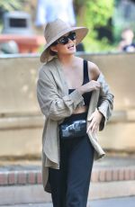 CHRISSY TEIGEN at a Park on Beverly Glen in Los Angeles 10/04/2024
