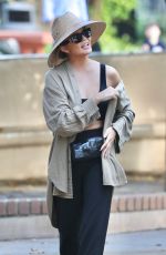 CHRISSY TEIGEN at a Park on Beverly Glen in Los Angeles 10/04/2024