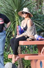 CHRISSY TEIGEN at a Park on Beverly Glen in Los Angeles 10/04/2024