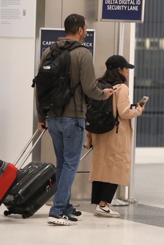 CORINNE FOXX and Her New Husband at LAX Airport 10/02/2024