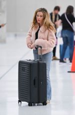 DENISE RICHARDS Arrives at JFK Airport in New York 10/17/2024