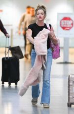 DENISE RICHARDS Arrives at JFK Airport in New York 10/17/2024