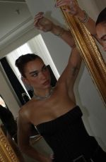 DUA LIPA at a Photoshoot 10/03/2024