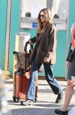 ELIZABETH OLSEN Arrives at JFK Airport in New York 10/16/2024