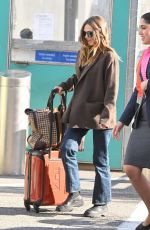 ELIZABETH OLSEN Arrives at JFK Airport in New York 10/16/2024